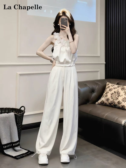 La Chapelle French-style "innocent-yet-alluring" two-piece set: featuring a lace-trimmed, asymmetrical-neckline top and high-waisted, slimming wide-leg trousers—a stylish, casual ensemble.