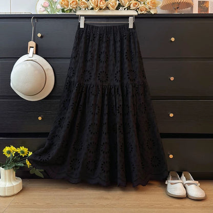 French-style heavy embroidered hollowed-out crochet lace midi skirt for women, spring 2026, high-waisted A-line pleated full skirt.