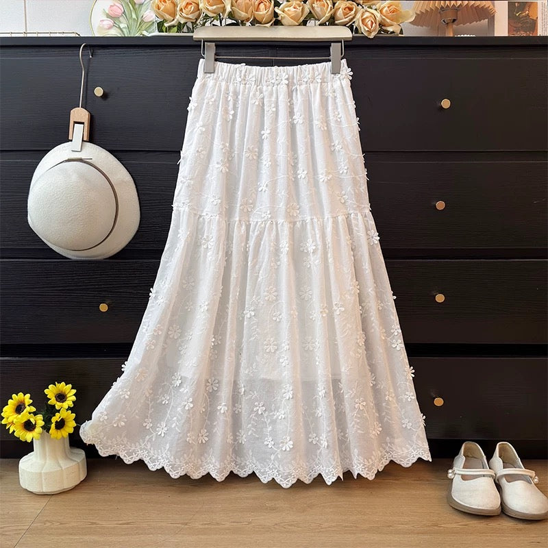 French-style gentle and feminine three-dimensional embroidered white midi skirt for women, spring 2026, elastic high waist, A-line, full skirt.