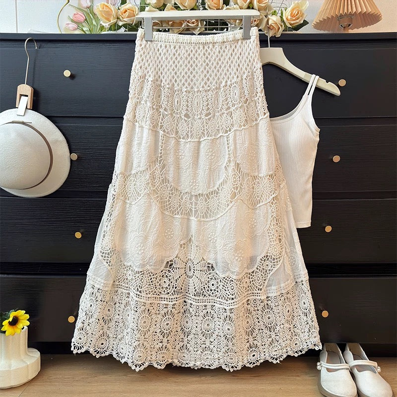 Ethnic style hollowed-out crochet lace midi skirt for women, spring 2026, elastic high waist, slimming A-line skirt.