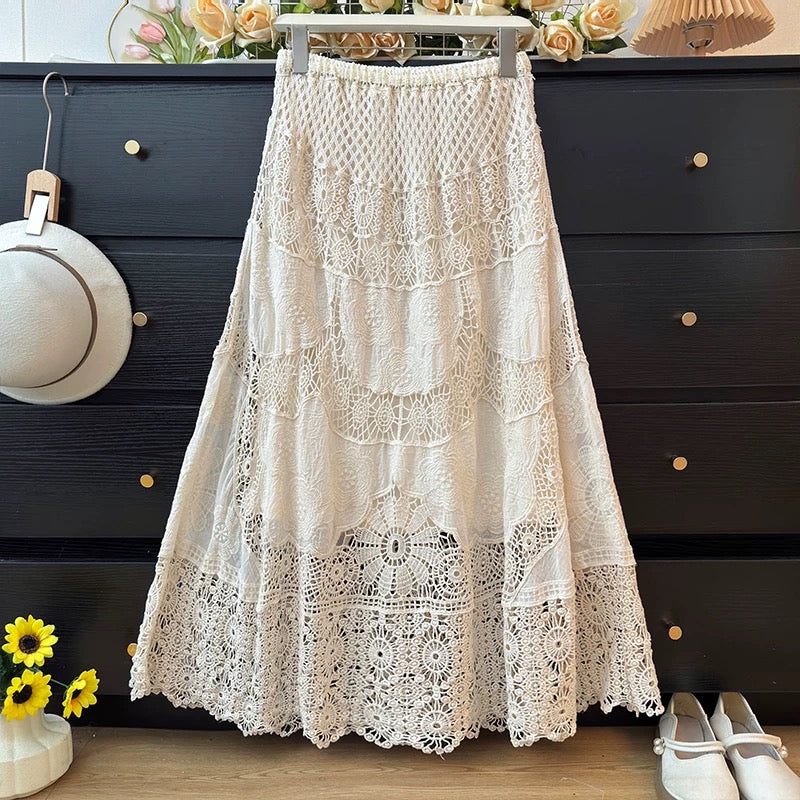 Ethnic style hollowed-out crochet lace midi skirt for women, spring 2026, elastic high waist, slimming A-line skirt.