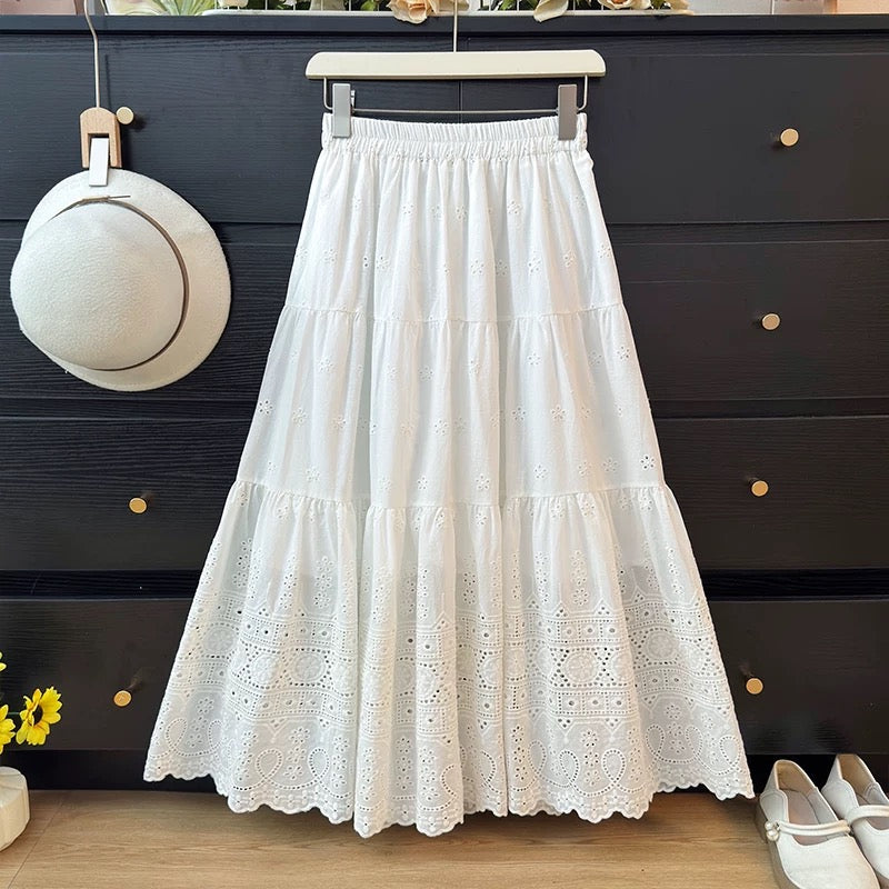 French-style openwork crochet embroidered white midi skirt for women, spring 2026, elastic waist, hip-covering A-line full skirt.