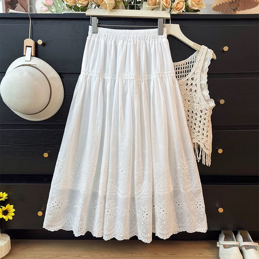 French-style delicate hollowed-out crochet embroidered midi skirt for women, spring 2026, high-waisted A-line pleated flared skirt.