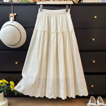 French-style ruffled openwork crochet skirt for women, slimming and sweet, youthful and pleated, loose-fitting A-line skirt, perfect for spring 2025.