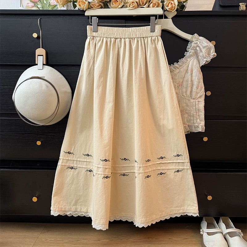 Forest-style retro lace embroidered midi skirt for women, new spring 2025 style, high-waisted, slimming A-line skirt with a large flared skirt.