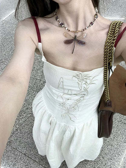 French suspender dress for women, summer waist slimming, over-the-knee long skirt, niche design, floral A-line skirt, trendy
