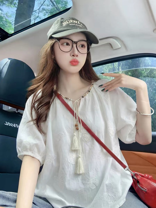 White, short-sleeved, embroidered, puff-sleeve blouse for women, summer 2026 new style, niche, high-end feel.