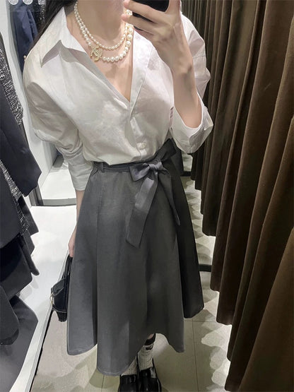 A complete set of ootd outfits for a younger look, a high-end spring suit, a long-sleeved shirt top, a high-waisted skirt, two-piece suit