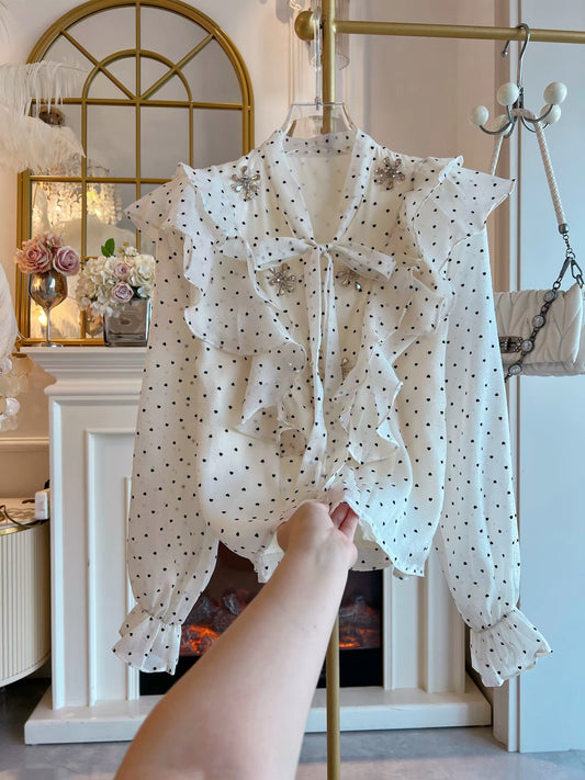Women's French-style long-sleeve blouse for Autumn 2026—featuring a unique, chic design with polka dots, rhinestone accents, and ruffled details.