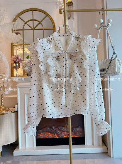 Women's French-style long-sleeve blouse for Autumn 2026—featuring a unique, chic design with polka dots, rhinestone accents, and ruffled details.