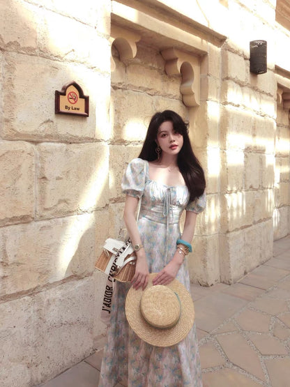 Eees' signature linen and Tencel French-style square neckline dress, perfect for a relaxing afternoon.