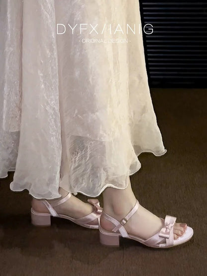 Exquisite women's sandals, new summer style for 2025, delicate and trendy pink French-style strappy high heels.