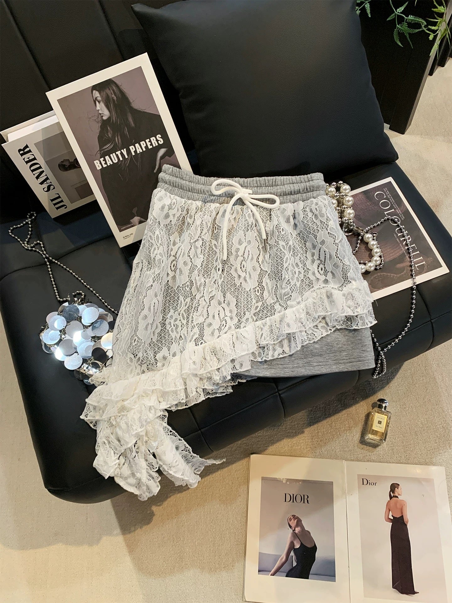 ZHOUYI/Monday: Designer-inspired faux two-piece lace high-waisted irregular ruffle skirt with a sexy vibe.