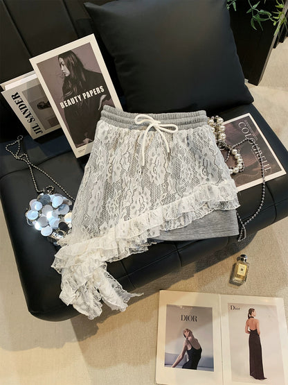 ZHOUYI/Monday: Designer-inspired faux two-piece lace high-waisted irregular ruffle skirt with a sexy vibe.