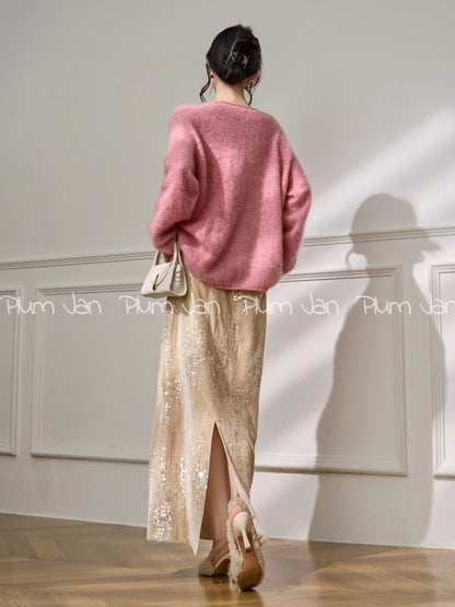 Plum Jan's Korean-style design top, a soft and gentle pink loose-fitting knit sweater perfect for winter.