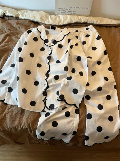 Women's French-style relaxed-fit polka-dot pajama set (Autumn 2026 new arrival)—loose long-sleeve top and trousers suitable for loungewear or casual outdoor wear.