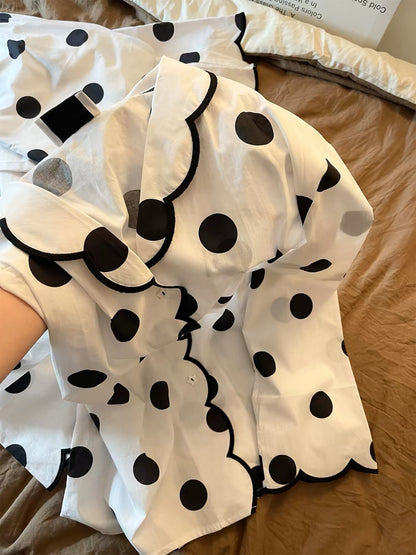 Women's French-style relaxed-fit polka-dot pajama set (Autumn 2026 new arrival)—loose long-sleeve top and trousers suitable for loungewear or casual outdoor wear.