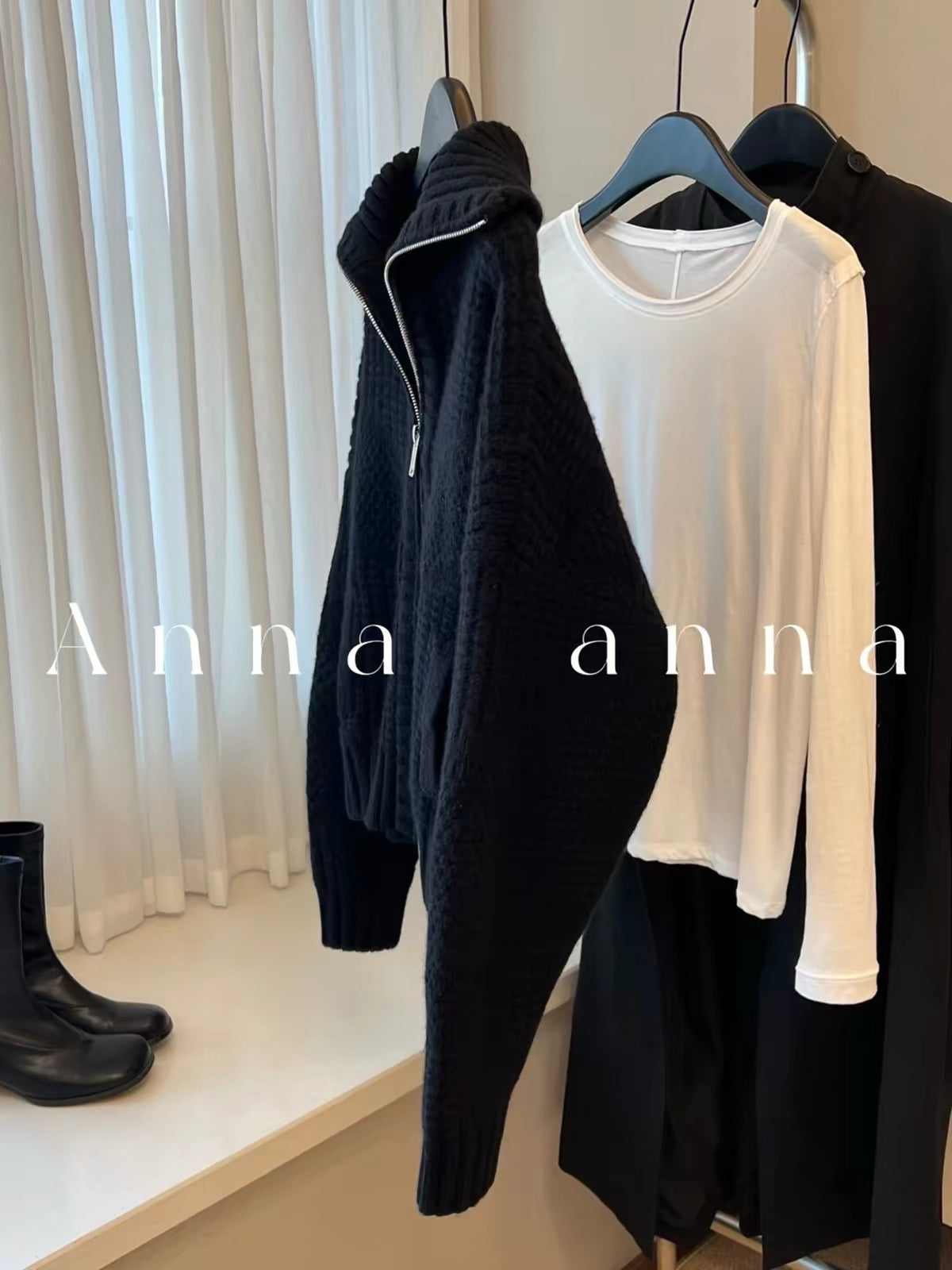 Highly recommended! A stylish, casual, and relaxed-fit women's knit cardigan for autumn, featuring black wool and a large lapel collar.