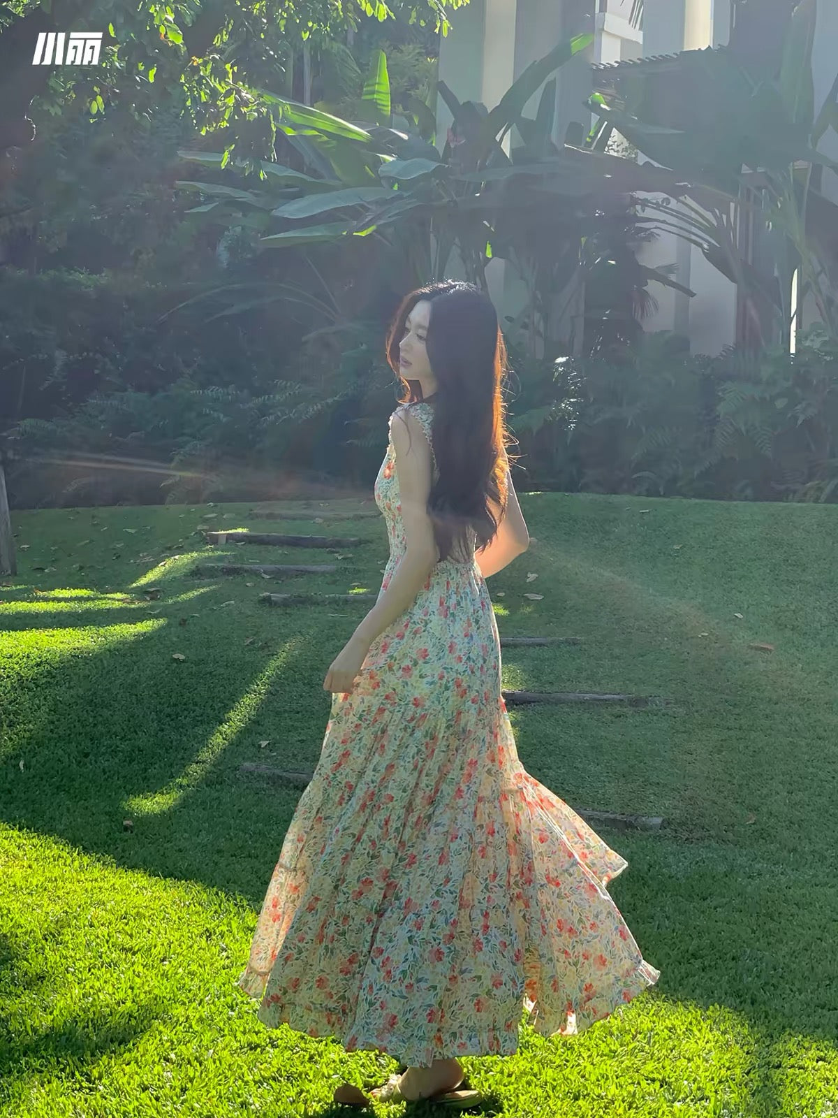 Xiao Li "Chasing the Wind in the Wilds" — Red floral-print maxi camisole dress featuring a paneled, tiered, voluminous A-line skirt.