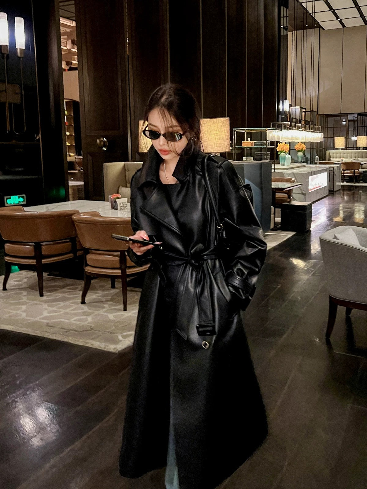 High-end popular black leather coat for women spring and autumn mid-length windbreaker loose casual temperament pu leather coat