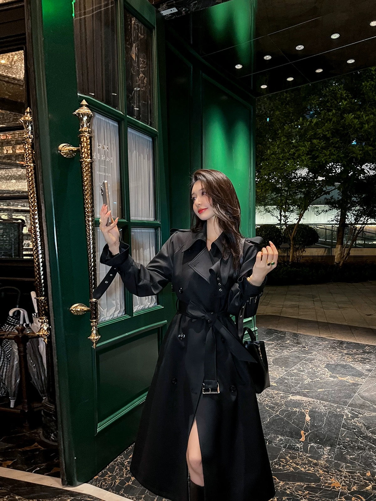 Black trench coat women's mid-length 2024 spring and autumn new British style design high-end loose casual coat