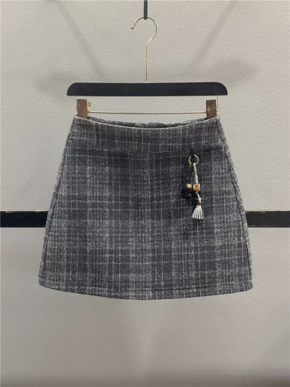 Retro plaid wool midi skirt for women, 2025 autumn/winter, design-conscious, high-waisted, slimming A-line bodycon skirt, short skirt.