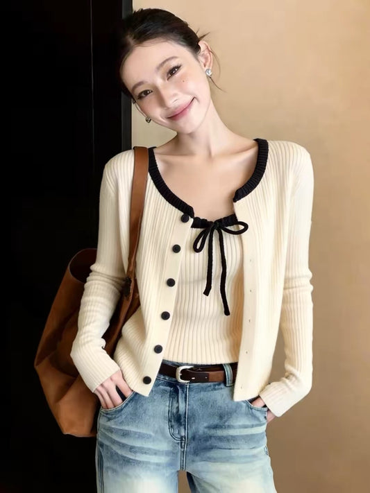 Korean-style two-piece set for women: a knit cardigan paired with a bow-detail camisole—a stunning, beautiful outfit perfect for autumn.