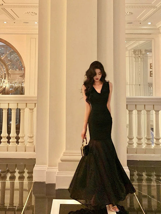 Ge Fuxuan black slouch collar sleeveless dress female 2025 new pure desire niche splicing slim fishtail long skirt