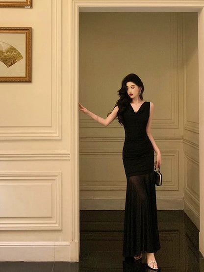 Ge Fuxuan black slouch collar sleeveless dress female 2025 new pure desire niche splicing slim fishtail long skirt