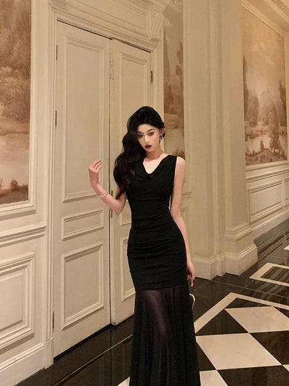 Ge Fuxuan black slouch collar sleeveless dress female 2025 new pure desire niche splicing slim fishtail long skirt
