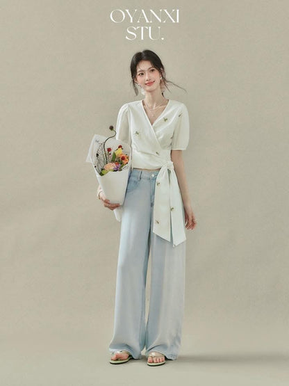Ouyang Xi "Lily of the Valley Island" cross-strap waist shirt short-sleeved V-neck top summer short floral blouse