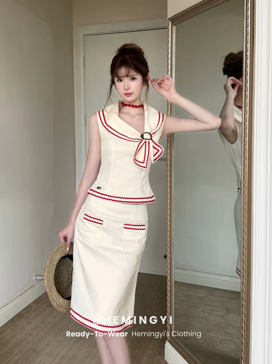 HeMingYi Sailor-Style Nautical Resort Set: A fitted ensemble featuring a shirt and skirt with a French-inspired design—embodying the "Old Money" aesthetic.