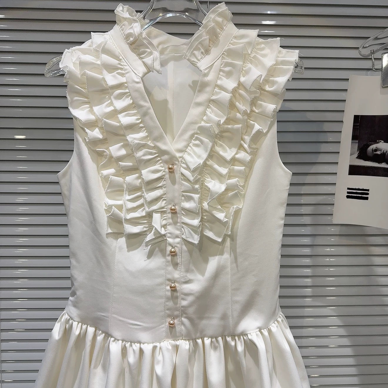 Internet celebrity same style 2025 summer new French sweet wood ear pleated design pearl button vest dress