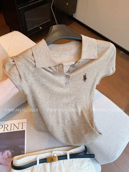 Women's short-sleeved knit top with a polo collar and small horse embroidery—a camel-colored, versatile, and flattering piece perfect for work or casual wear, embodying the "Old Money" aesthetic.
