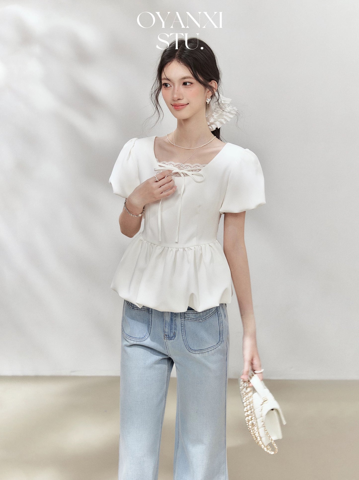 Ouyang Xi's "Cold Rain Rose" white bud sleeve lace stitching lace top simple temperament T-shirt for women