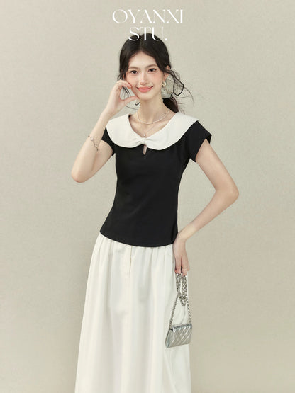 Ouyang Xi's "Audrey Hepburn's Past" contrast color doll collar short-sleeved T-shirt for women in summer college style black straight shoulder top
