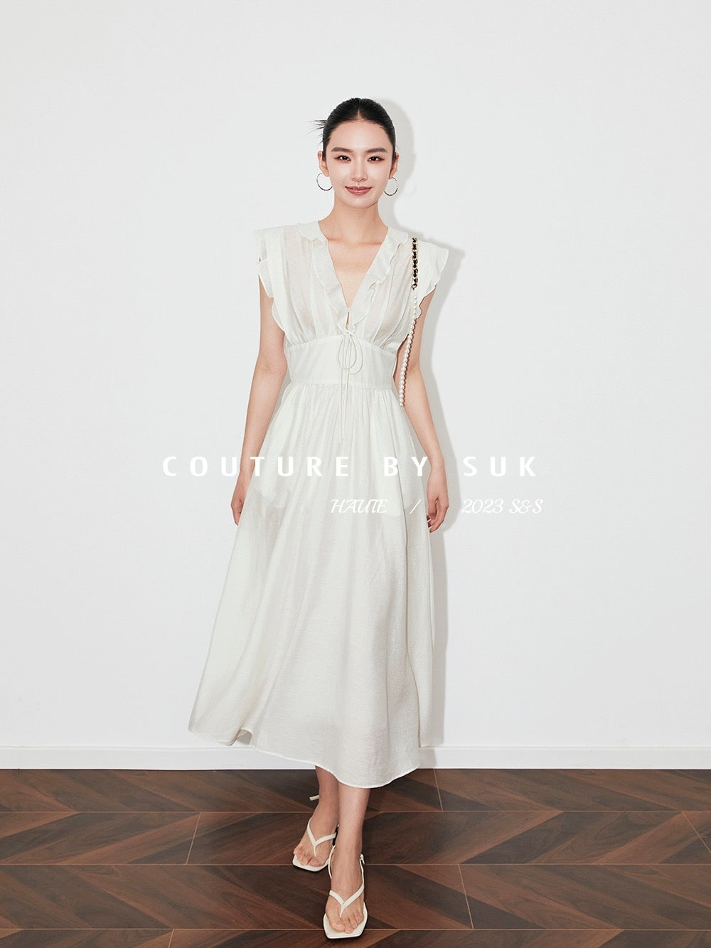 SUK White Gardenia! 2024 New Summer Dress Women's White Mid-Length V-Neck Sleeveless Resort Style Skirt