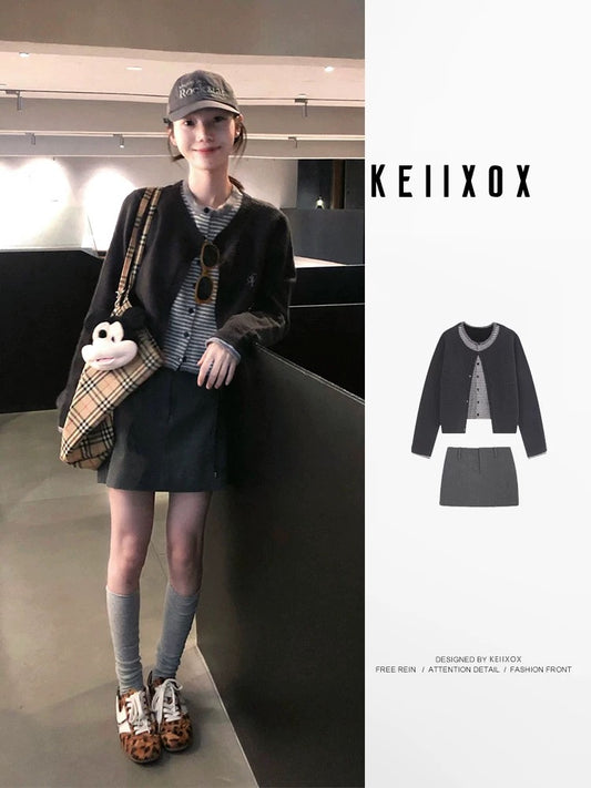 Korean style early autumn outfit set: a complete set of fashionable and sophisticated two-piece striped sweater and skirt.