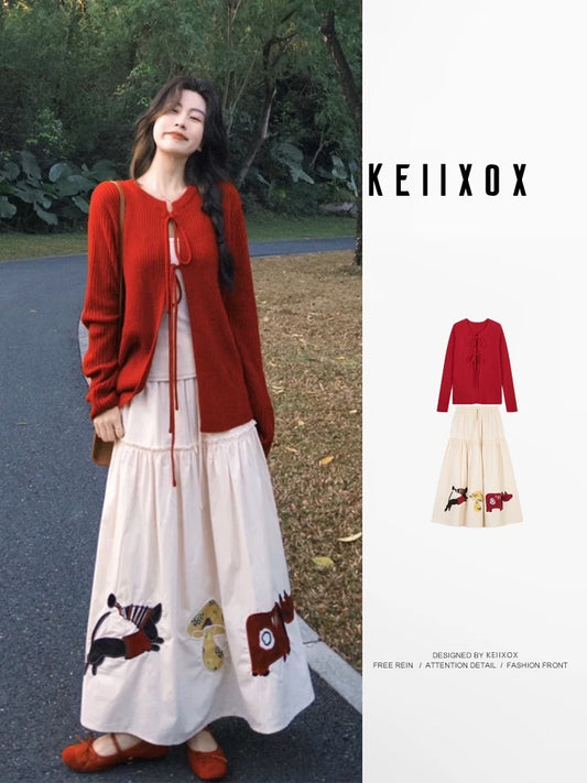 Autumn OOTD outfit: A sophisticated Korean-style two-piece set featuring a red tie-up knit cardigan and cartoon skirt.