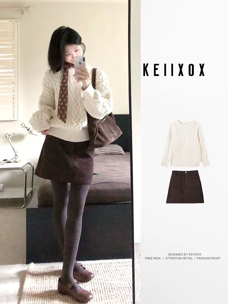 A sophisticated two-piece winter outfit: a preppy Korean-style cable knit sweater and skirt set.