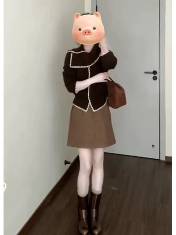 A complete autumn/winter outfit: a sophisticated scarf, turtleneck sweater, knitted cardigan, and skirt set—a unique and beautiful set.