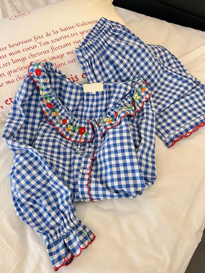Women’s fresh-style blue plaid embroidered pajama set – 2026 spring/autumn new collection, featuring a sophisticated, high-end look with long-sleeved top and trousers.