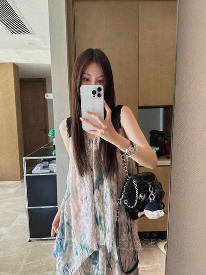 Qian Meixi oil painting style jacquard watermark suspender dress high-end design irregular holiday style long skirt for women