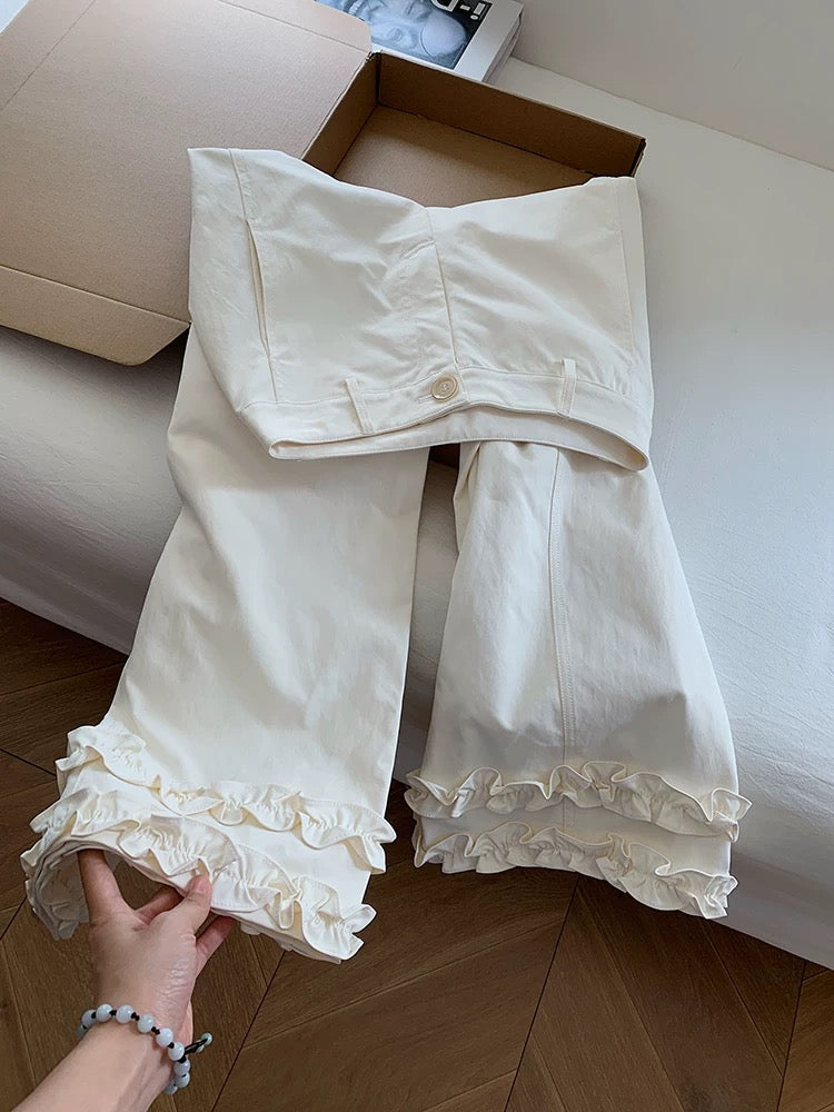 White high-waisted flared casual pants with ruffled hem, women's 2025 new style wide-leg pants with a flared design.