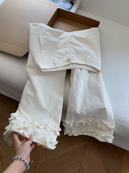 White high-waisted flared casual pants with ruffled hem, women's 2025 new style wide-leg pants with a flared design.