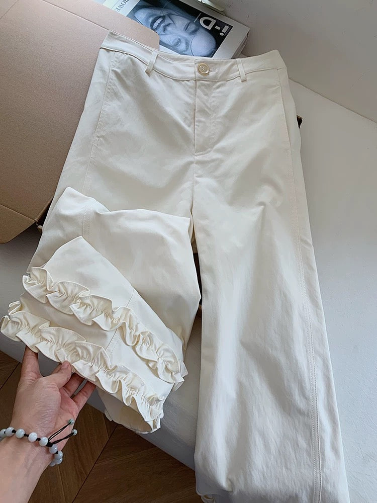 White high-waisted flared casual pants with ruffled hem, women's 2025 new style wide-leg pants with a flared design.