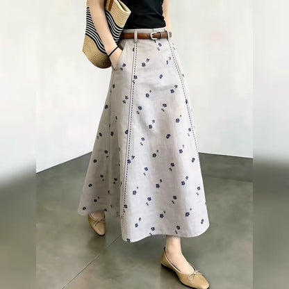 Korean-style floral A-line midi skirt for women – high-waisted, slimming, loose-fit, and elegant; a new arrival for Autumn 2026, perfect for work or casual wear.