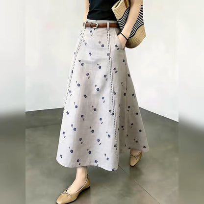 Korean-style floral A-line midi skirt for women – high-waisted, slimming, loose-fit, and elegant; a new arrival for Autumn 2026, perfect for work or casual wear.