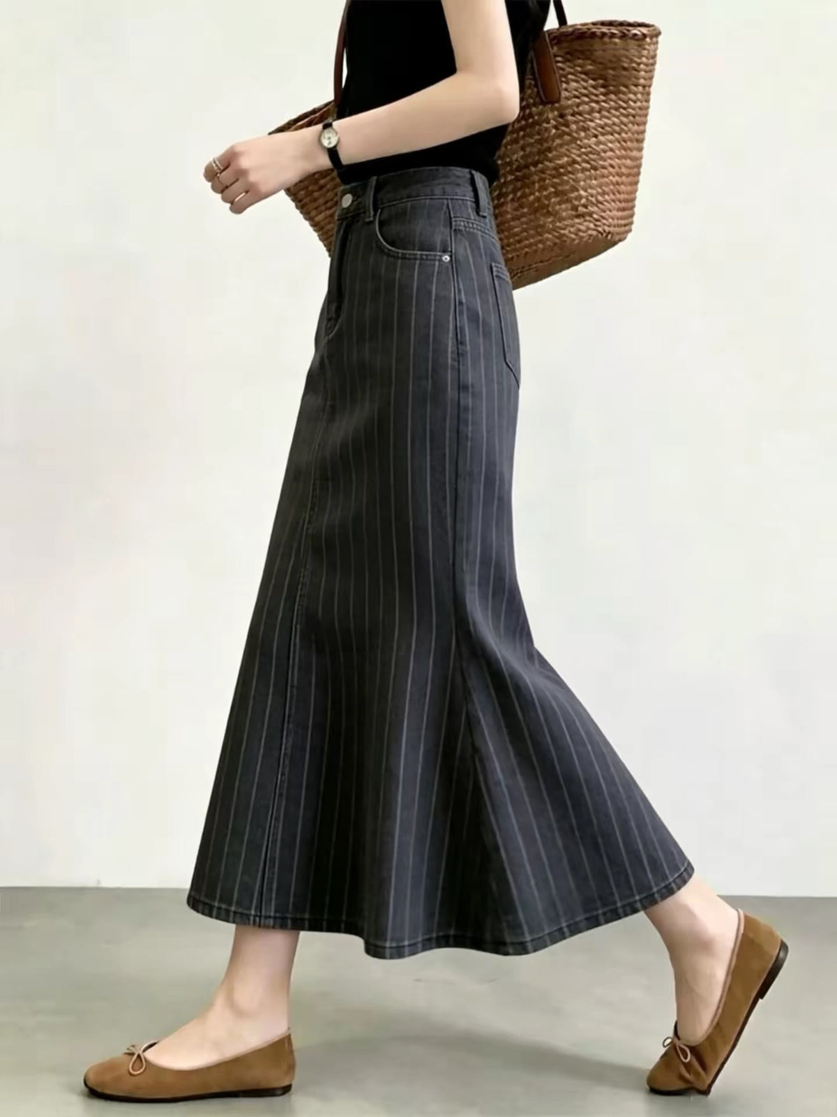Women’s A-line midi skirt in a dark gray striped pattern—a versatile, high-waisted, and flattering choice for workwear, perfect for the new autumn season.