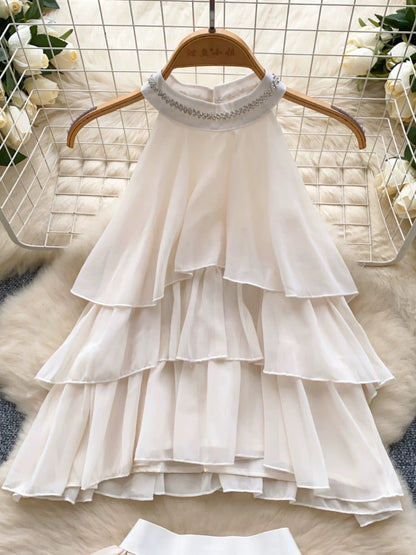 Rich Heiress Style Suit: Pure and alluring beaded halter neck sleeveless chiffon top with ruffles + high-waisted tulip shorts